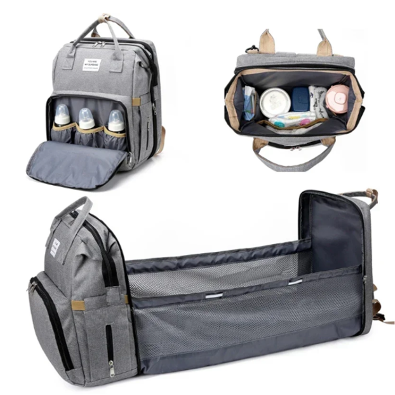 Gray diaper bag with multiple compartments and organizer on a white background